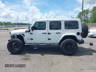 2021 Jeep Wrangler Unlimited Sahara Altitude z VIN 1C4HJXEN7MW518395, wystawiony jako IAAI lot #42484314 z przebiegiem 55 000 mil mil oraz . Historia ofert i sprzedaży dostępna na DreamBid. Obrazek 14.