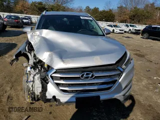 2017 Hyundai Tucson SE with VIN KM8J33A46HU519309, listed as a Copart auction lot 42677955 with 127,202 mi miles and Salvage Title. Bid and sale history available at DreamBid. Image 5.
