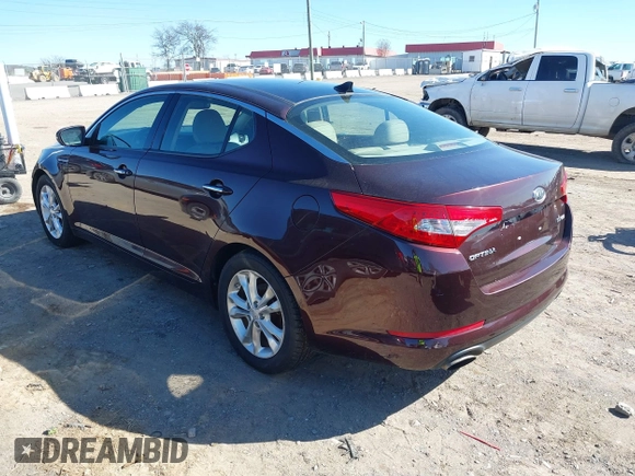 2012 Kia Optima EX with VIN 5XXGN4A6XCG041961, listed as a IAAI auction lot 41705409 with 171,216 mi miles and . Bid and sale history available at carsss.com. Image 3.