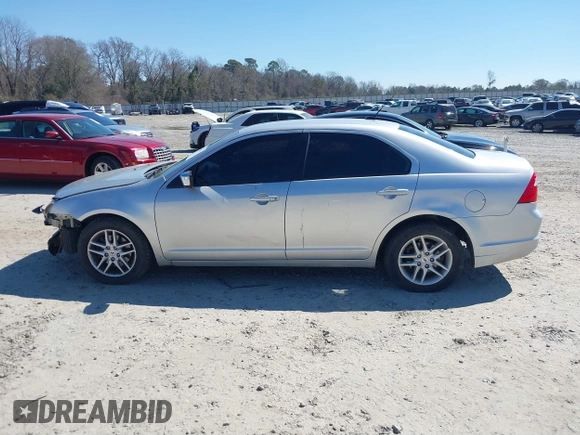 2011 Ford Fusion S with VIN 3FAHP0GA3BR311556, listed as a IAAI auction lot 41668511 with 200,159 mi miles. Bid and sale history available at carsss.com. Image 14.