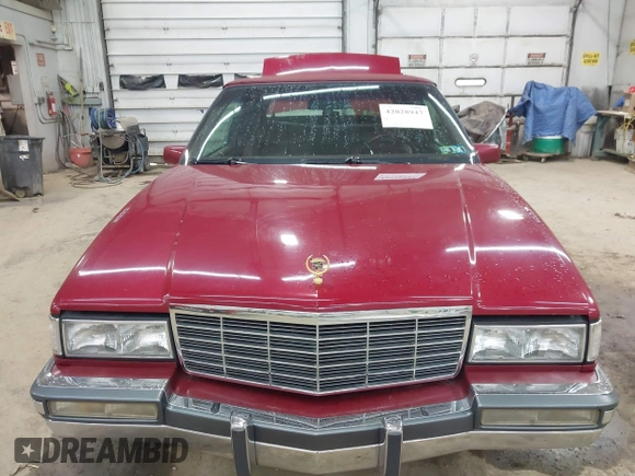 1991 Cadillac DeVille z VIN 1G6CD13B0M4305164, wystawiony jako IAAI lot #42028947 z przebiegiem 33 865 mil mil oraz . Historia ofert i sprzedaży dostępna na DreamBid. Obrazek 6.