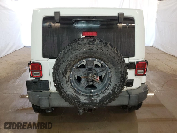 2012 Jeep Wrangler Arctic with VIN 1C4AJWBG4CL146788, listed as a Copart auction lot 75648234 with 100,879 mi miles and Clean title. Bid and sale history available at DreamBid. Image 6.