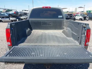 2004 Dodge 1500 SLT with VIN 1D7HA18NX4S723229, listed as a IAAI auction lot 42169829 with 228,812 mi miles. Bid and sale history available at carsss.com. Image 15.