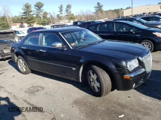 2005 Chrysler 300 300C AWD z VIN 2C3AK63H65H671814, wystawiony jako Copart lot #82867974 z przebiegiem 153 186 mil mil oraz Nie do naprawy. Historia ofert i sprzedaży dostępna na DreamBid. Obrazek 4.