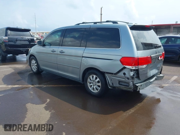 2010 Honda Odyssey EX-L with VIN 5FNRL3H6XAB061092, listed as a IAAI auction lot 41645143 with 165,941 mi miles. Bid and sale history available at carsss.com. Image 3.