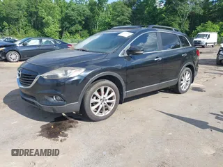2015 Mazda CX-9 Grand Touring with VIN JM3TB2DA4F0464186, listed as a IAAI auction lot 42227595 with 124,526 mi miles and . Bid and sale history available at DreamBid. Image 17.