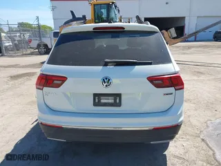 2021 Volkswagen Tiguan SE with VIN 3VV2B7AX4MM031490, listed as a IAAI auction lot 41829654 with 55,739 mi miles. Bid and sale history available at carsss.com. Image 15.