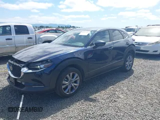 2021 Mazda CX-30 Select with VIN 3MVDMBBL6MM243726, listed as a IAAI auction lot 42353943 with 67,239 mi miles and . Bid and sale history available at DreamBid. Image 2.