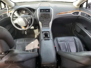 2014 Lincoln MKZ z VIN 3LN6L2GK6ER806741, wystawiony jako Copart lot #57455755 z przebiegiem 96 849 mil mil oraz Szkoda całkowita • Salvage title. Historia ofert i sprzedaży dostępna na DreamBid. Obrazek 8.