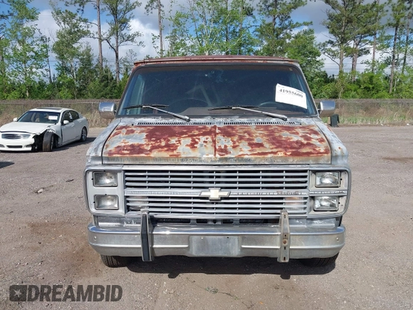 1983 Chevrolet Chevy Van z VIN 1GCEG25H7D7170543, wystawiony jako IAAI lot #41955600 z przebiegiem 49 027 mil mil oraz . Historia ofert i sprzedaży dostępna na DreamBid. Obrazek 6.