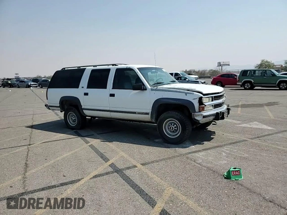 1994 Chevrolet Suburban z VIN 1GNGK26F1RJ444762, wystawiony jako Copart lot #86776674 z przebiegiem 354 375 mil mil oraz Szkoda całkowita • Salvage title. Historia ofert i sprzedaży dostępna na DreamBid. Obrazek 11.