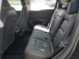 2024 Tesla Model Y с VIN 7SAYGDED1RF053003, выставлен на аукционе Copart как лот 63120195 с пробегом 8 679 миль миль и Списание • Salvage title. История ставок и продаж доступна на DreamBid. Изображение 11.