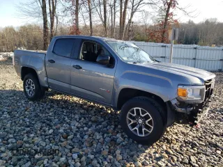 2021 GMC Canyon 4WD AT4 w/Cloth with VIN 1GTG6FEN0M1236099, listed as a Copart auction lot 80911974 with 122,672 mi miles and Salvage Title. Bid and sale history available at carsss.com. Image 4.