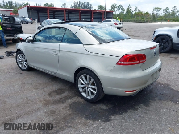 2012 Volkswagen Eos Komfort with VIN WVWBW7AHXCV006075, listed as a IAAI auction lot 42054520 with 104,037 mi miles and . Bid and sale history available at DreamBid. Image 3.