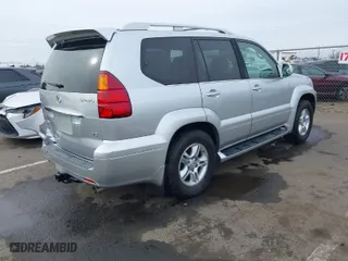 2006 Lexus GX 470 with VIN JTJBT20X160097367, listed as a IAAI auction lot 41582682 with 143,452 mi miles. Bid and sale history available at carsss.com. Image 4.
