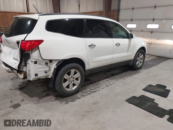 2012 Chevrolet Traverse 1LT z VIN 1GNKVGEDXCJ241794, wystawiony jako IAAI lot #41902110 z przebiegiem 138 305 mil mil oraz . Historia ofert i sprzedaży dostępna na DreamBid. Obrazek 4.