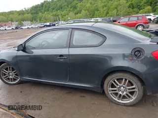 2007 Scion tC Spec z VIN JTKDE177570172801, wystawiony jako IAAI lot #42232540 z przebiegiem 251 571 mil mil oraz . Historia ofert i sprzedaży dostępna na DreamBid. Obrazek 14.