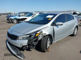 2017 Kia Forte LX z VIN 3KPFK4A71HE064591, wystawiony jako IAAI lot #42425957 z przebiegiem 161 494 mil mil oraz . Historia ofert i sprzedaży dostępna na DreamBid. Obrazek 2.