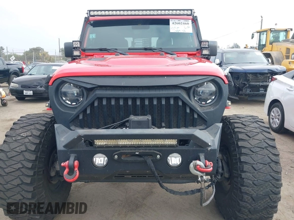 2020 Jeep Gladiator Rubicon with VIN 1C6JJTBG4LL178260, listed as a IAAI auction lot 42602460 with 61,899 mi miles and . Bid and sale history available at DreamBid. Image 6.
