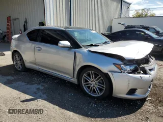 2011 Scion tC with VIN JTKJF5C74B3010047, listed as a Copart auction lot 47317555 with 125,659 mi miles and Salvage Title. Bid and sale history available at carsss.com. Image 4.