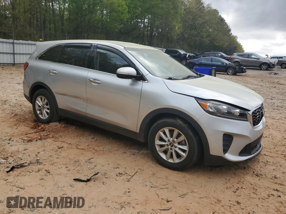 2019 Kia Sorento LX with VIN 5XYPG4A33KG515176, listed as a Copart auction lot 51004045 with 129,040 mi miles and Salvage Title. Bid and sale history available at carsss.com. Image 4.
