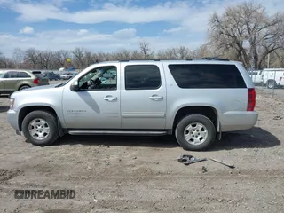 2013 Chevrolet Suburban LT with VIN 1GNSKJE78DR108955, listed as a IAAI auction lot 42004032 with 114,729 mi miles and . Bid and sale history available at DreamBid. Image 14.
