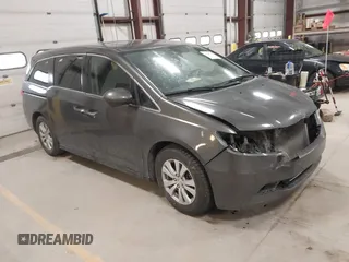 2015 Honda Odyssey EX-L with VIN 5FNRL5H64FB055890, listed as a IAAI auction lot 41706141 with 155,167 mi miles and . Bid and sale history available at carsss.com. Image 1.