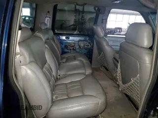 1999 Chevrolet Suburban with VIN 3GNEC16R5XG218523, listed as a Copart auction lot 72568494 with 297,020 mi miles and Salvage Title. Bid and sale history available at DreamBid. Image 12.