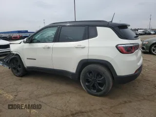 2019 Jeep Compass Altitude with VIN 3C4NJCBB4KT618673, listed as a Copart auction lot 51801955 with 104,784 mi miles and Salvage title. Bid and sale history available at DreamBid. Image 2.