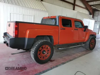 2009 Hummer H3 with VIN 5GNEN13E998144228, listed as a Copart auction lot 70231814 with 119,203 mi miles and Clean Title. Bid and sale history available at DreamBid. Image 3.