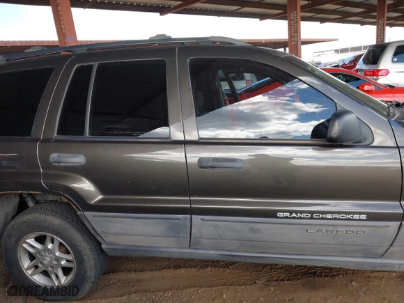 2004 Jeep Grand Cherokee Laredo with VIN 1J4GX48N64C436853, listed as a IAAI auction lot 41785918 with 118,578 mi miles. Bid and sale history available at carsss.com. Image 12.