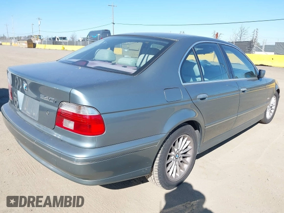 2002 BMW 5 Series 540iA with VIN WBADN63422GN87250, listed as a IAAI auction lot 41681974 with 182,007 mi miles. Bid and sale history available at carsss.com. Image 4.