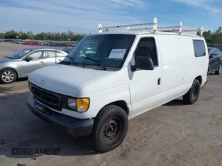 2001 Ford Econoline Cargo with VIN 1FTRE14291HA84414, listed as a IAAI auction lot 41463623 with 192,835 mi miles. Bid and sale history available at carsss.com. Image 18.