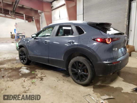 2023 Mazda CX-30 S Carbon Edition with VIN 3MVDMBCM7PM535140, listed as a Copart auction lot 44746645 with 51,810 mi miles and Clean Title. Bid and sale history available at DreamBid. Image 2.