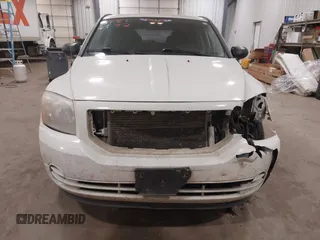 2010 Dodge Caliber SXT with VIN 1B3CB4HA3AD590654, listed as a IAAI auction lot 41814572 with 203,422 mi miles and . Bid and sale history available at DreamBid. Image 13.