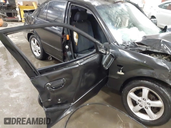 2003 Mazda Protege DX with VIN JM1BJ226431112902, listed as a IAAI auction lot 41939907 with 184,618 mi miles and . Bid and sale history available at DreamBid. Image 20.