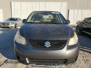 2011 Suzuki SX4 LE with VIN JS2YC5A2XB6304661, listed as a Copart auction lot 81130714 with 70,827 mi miles and Clean Title. Bid and sale history available at carsss.com. Image 5.