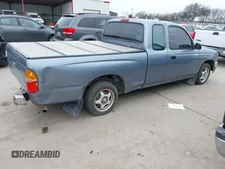 1997 Toyota Tacoma with VIN 4TAVL52N0VZ311543, listed as a IAAI auction lot 41644677 with 292,131 mi miles. Bid and sale history available at carsss.com. Image 4.