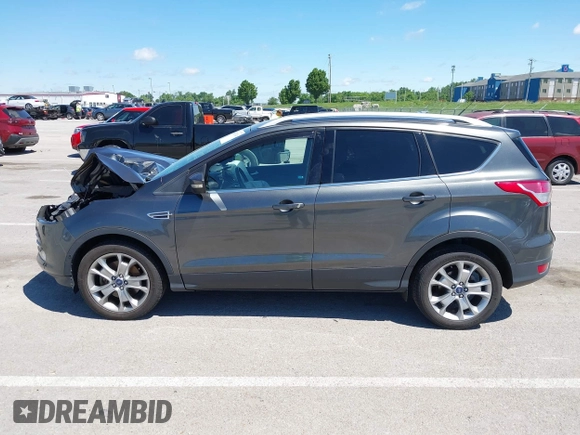 2015 Ford Escape Titanium z VIN 1FMCU9J92FUB01007, wystawiony jako IAAI lot #42319246 z przebiegiem 90 782 mil mil oraz . Historia ofert i sprzedaży dostępna na DreamBid. Obrazek 15.