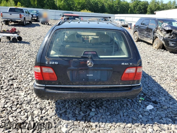 1999 Mercedes-Benz E-Class with VIN WDBJH82F8XX020574, listed as a Copart auction lot 63730124 with 201,401 mi miles and Salvage Title. Bid and sale history available at carsss.com. Image 6.