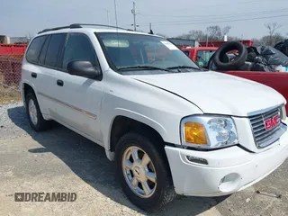2007 GMC Envoy SLE with VIN 1GKDS13S772142847, listed as a IAAI auction lot 41605904 with 131,564 mi miles. Bid and sale history available at carsss.com. Image 1.