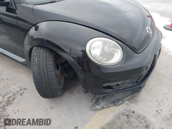 2013 Volkswagen Beetle Entry with VIN 3VWFP7AT8DM644840, listed as a IAAI auction lot 41387843 with 195,597 mi miles and . Bid and sale history available at DreamBid. Image 6.