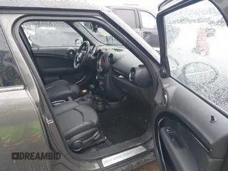 2014 MINI Countryman S z VIN WMWZC5C55EWP38431, wystawiony jako IAAI lot #41710523 z przebiegiem 153 441 mil mil oraz . Historia ofert i sprzedaży dostępna na DreamBid. Obrazek 5.