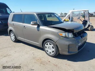 2012 Scion xB with VIN JTLZE4FE7CJ019196, listed as a IAAI auction lot 41883069 with 238,168 mi miles. Bid and sale history available at carsss.com. Image 1.