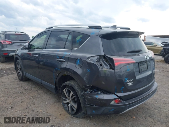 2018 Toyota RAV4 XLE with VIN JTMRFREV2JJ730874, listed as a IAAI auction lot 41980075 with 60,268 mi miles. Bid and sale history available at carsss.com. Image 3.