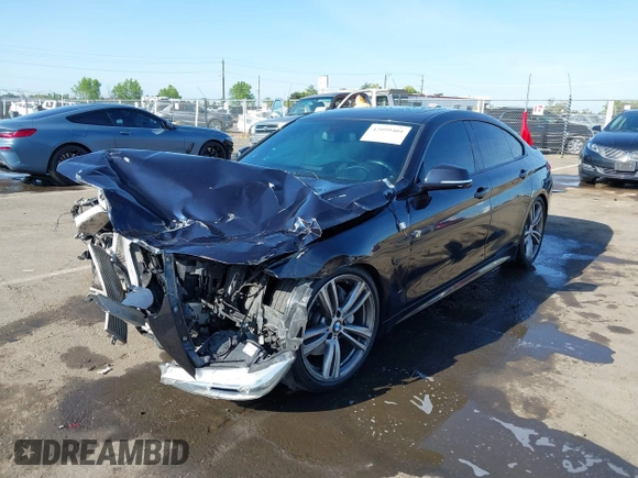 2015 BMW 4 Series 435i with VIN WBA4B1C54FD418309, listed as a IAAI auction lot 42099401 with 119,982 mi miles and . Bid and sale history available at carsss.com. Image 17.