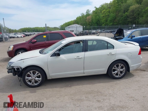 2012 Ford Fusion SE with VIN 3FAHP0HG7CR351904, listed as a IAAI auction lot 42115834 with 80,659 mi miles and . Bid and sale history available at DreamBid. Image 15.