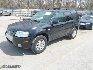 2005 Mercury Mariner Luxury with VIN 4M2CU57115DJ19408, listed as a IAAI auction lot 42060685 with 204,744 mi miles. Bid and sale history available at carsss.com. Image 2.