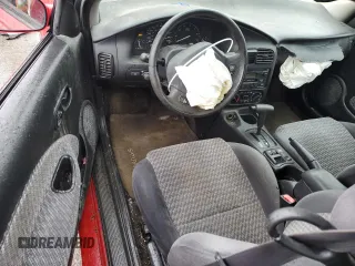 2000 Saturn SC with VIN 1G8ZY1276YZ157243, listed as a Copart auction lot 52509885 with 102,215 mi miles and Salvage Title. Bid and sale history available at carsss.com. Image 8.