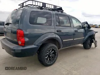 2007 Dodge Durango SLT z VIN 1D8HD48P87F581689, wystawiony jako Copart lot #54937005 z przebiegiem Nie podano mil oraz Szkoda całkowita • Salvage title. Historia ofert i sprzedaży dostępna na DreamBid. Obrazek 3.
